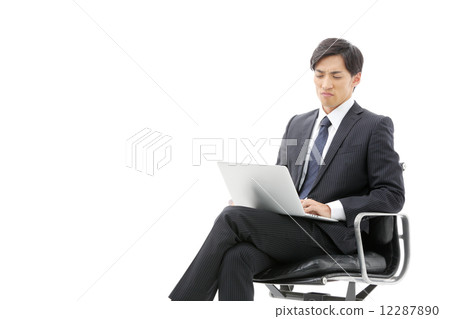 Businessman / laptop computer Businessman / laptop computer 12287890
