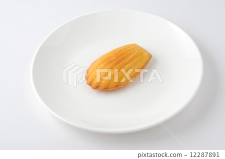 Madeleine French confection on dish White background Madeleine French confection on dish White background 12287891