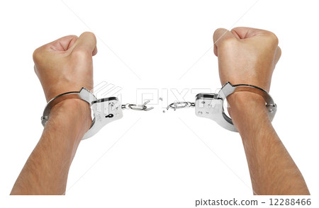 Hands and breaking handcuffs 12288466
