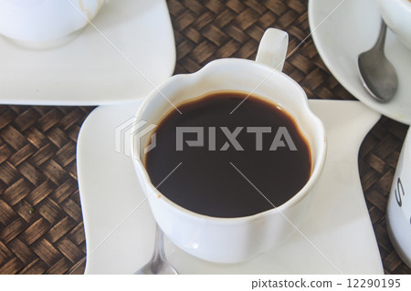 black  coffee on wooden table 12290195