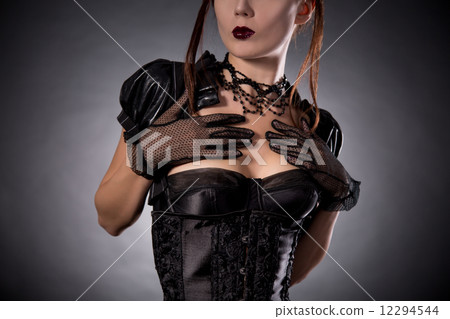 Close-up shot of attractive young woman in Victorian style corse Close-up shot of attractive young woman in Victorian style corse 12294544