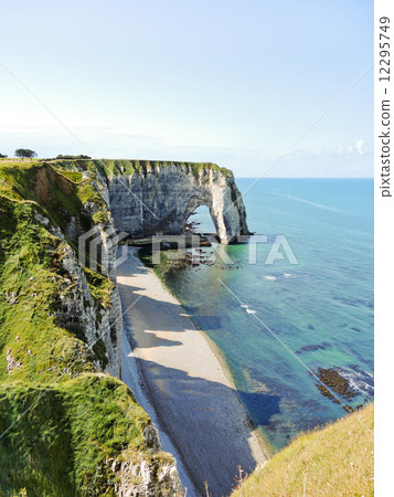 coast of english channel beach in Etretat 12295749
