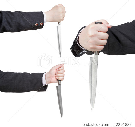 set of knife in businessman hand 12295882