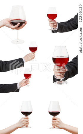 set od red wine glasses in hand 12296139