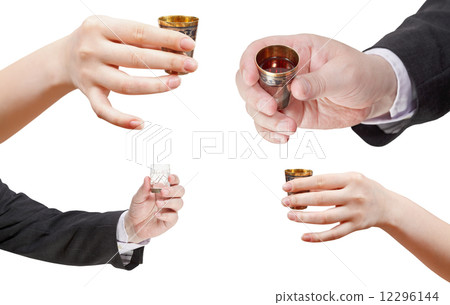 set of hands with glass of spirits 12296144