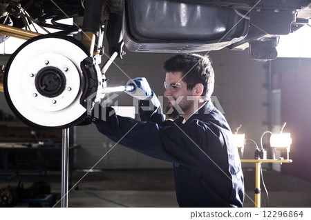 Car mechanic at work Car mechanic at work 12296864