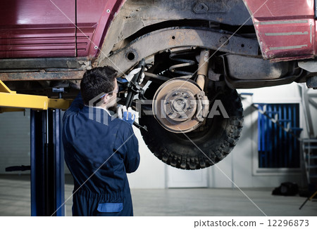Car mechanic at work Car mechanic at work 12296873