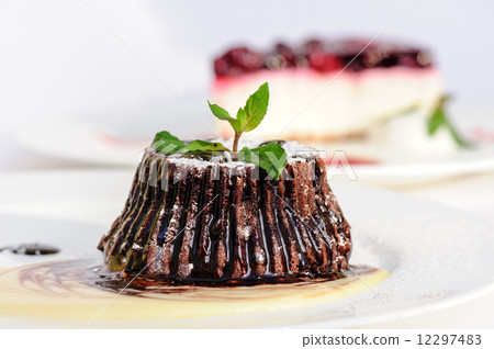 Chocolate fondant with peppermint leaves 12297483