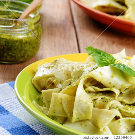 Pasta papardelle with pesto sauce 12299460