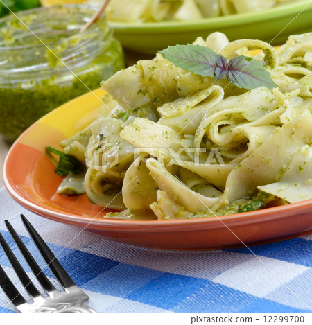 Pasta papardelle with pesto sauce Pasta papardelle with pesto sauce 12299700
