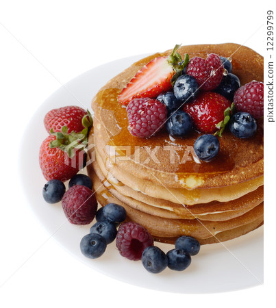 Pancakes with berries and honey over white Pancakes with berries and honey over white 12299799