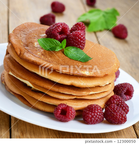 Ready to eat pancakes with raspberry 12300050