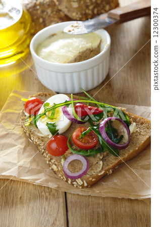 Liver pate sandwich with vegetables arugula and boiled egg 12300374