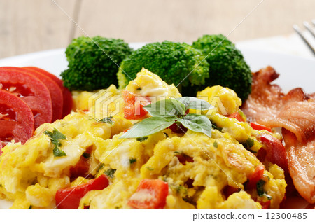 Scrambled eggs with bacon 12300485