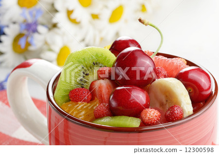 Red cup with fruits 12300598