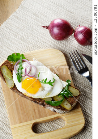 Fried egg open sandwich 12300791