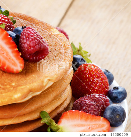Pancakes with berries closeup Pancakes with berries closeup 12300909