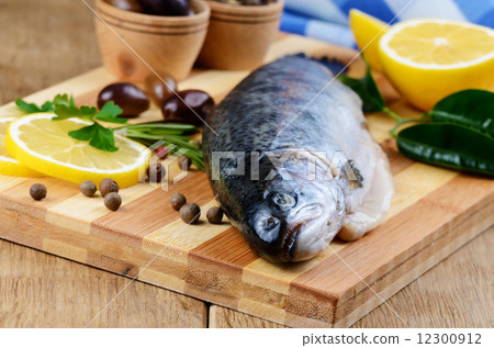 Raw trout on the board Raw trout on the board 12300912