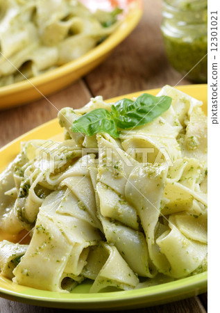 Pasta papardelle with pesto sauce Pasta papardelle with pesto sauce 12301021