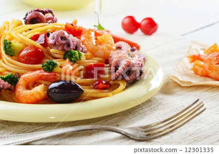 Seafood spaghetti marinara pasta dish 12301335