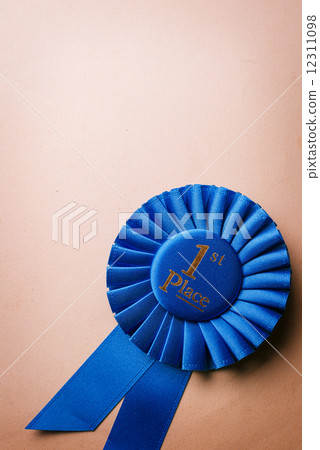 Blue first place winner rosette 12311098