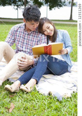 Young couple in a park. Young couple in a park. 12311269