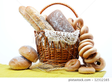 Fresh bread in the basket fully isolated. Fresh bread in the basket fully isolated. 12312165