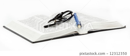 open book / Holy Bible and pencil on white background. 12312350