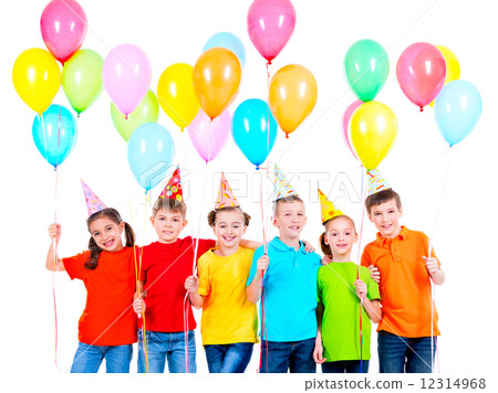 Group of children in colored t-shirts and party hats. Group of children in colored t-shirts and party hats. 12314968