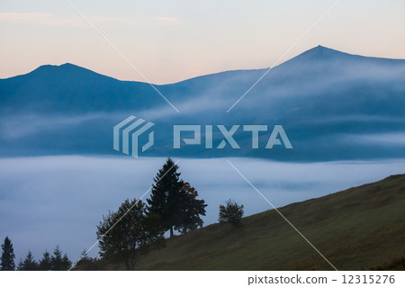 Majestic sunset in the mountains landscape 12315276