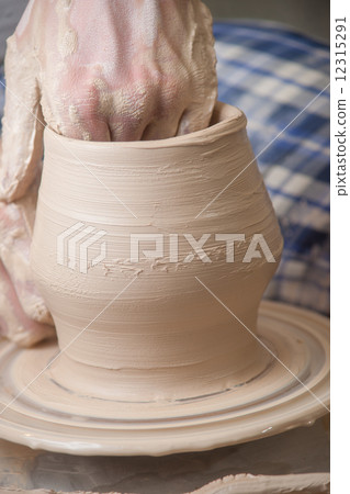 Hands of a potter Hands of a potter 12315291