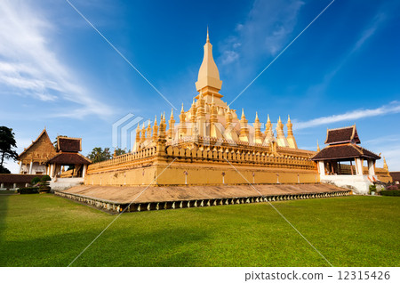 Golden buddhist pagoda of Phra That Luang Temple. Vientiane, Laos  12315426