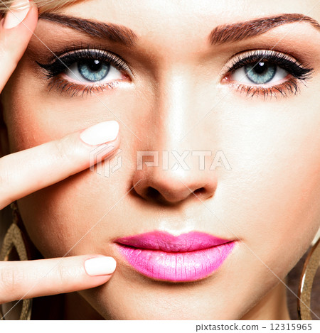 Portrait of  young pretty face of a caucasian woman 12315965