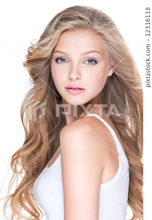 Beautiful young woman with long curly hair. Beautiful young woman with long curly hair. 12316118