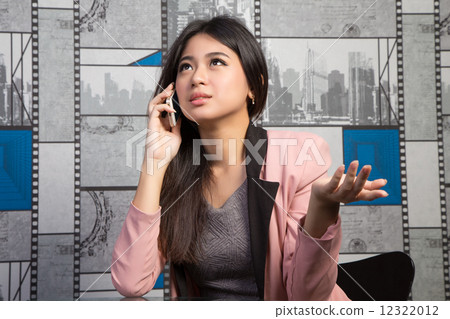 Office lady talking to phone 12322012