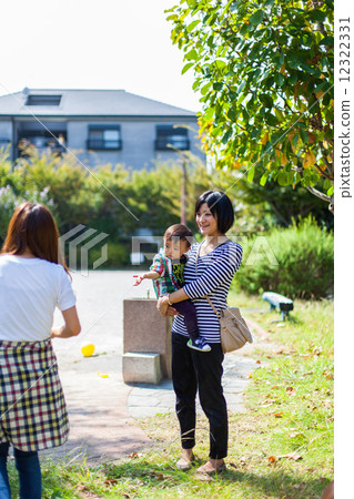 Parents playing soap bubbles 12322331