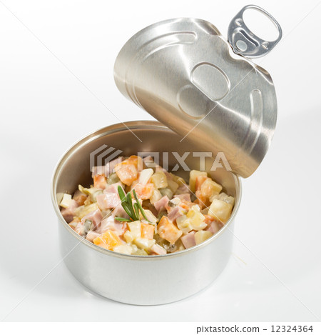 Appetizer. Creative cuisine. Russian salad in a tin can 12324364