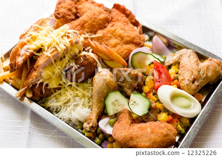 Delicious food on white plate Delicious food on white plate 12325226