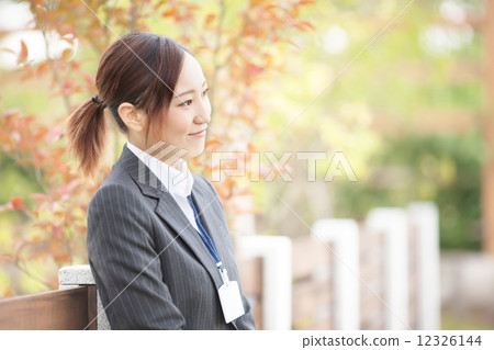 Cute OL rest in autumn park Cute OL rest in autumn park 12326144