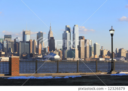 Lower Manhattan Skyline Hamilton Park has a front fence 12326879