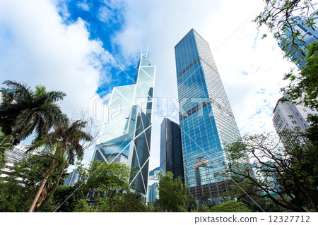 Modern business buildings with blue sky, shot in hong kong, asia Modern business buildings with blue sky, shot in hong kong, asia 12327712