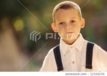 Smiling happy confident little boy 12328230