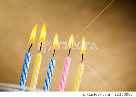 Burning birthday candles Burning birthday candles 12330002