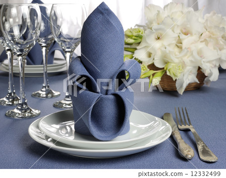 Napkin decorated with flower Napkin decorated with flower 12332499