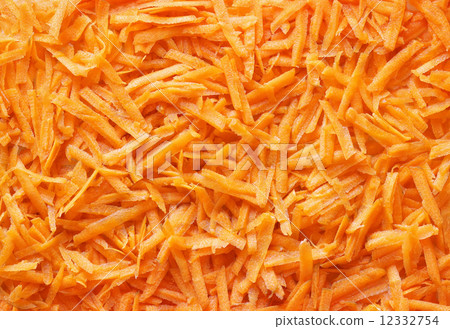 Grated carrot close-up, for backgrounds or textures. A close vie 12332754