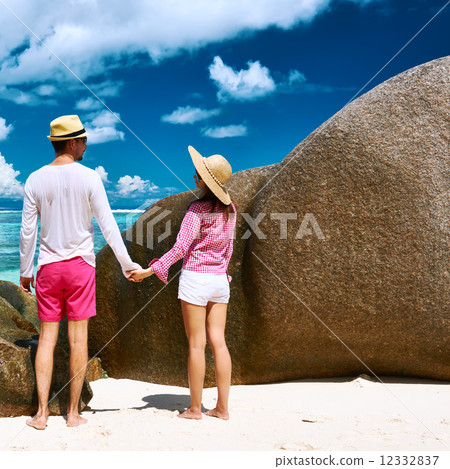 Couple on a beach at Seychelles Couple on a beach at Seychelles 12332837