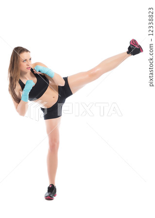 Young woman posing in a boxing stand 12338823