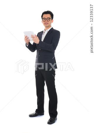 chinese business man using tablet 12339137