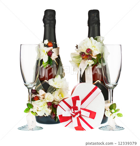 Champagne Bottles with Glass and Wedding Decoration of Flower Ar Champagne Bottles with Glass and Wedding Decoration of Flower Ar 12339379