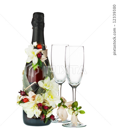 Champagne Bottle and Glass with Wedding Decoration of Flower Arr 12339380